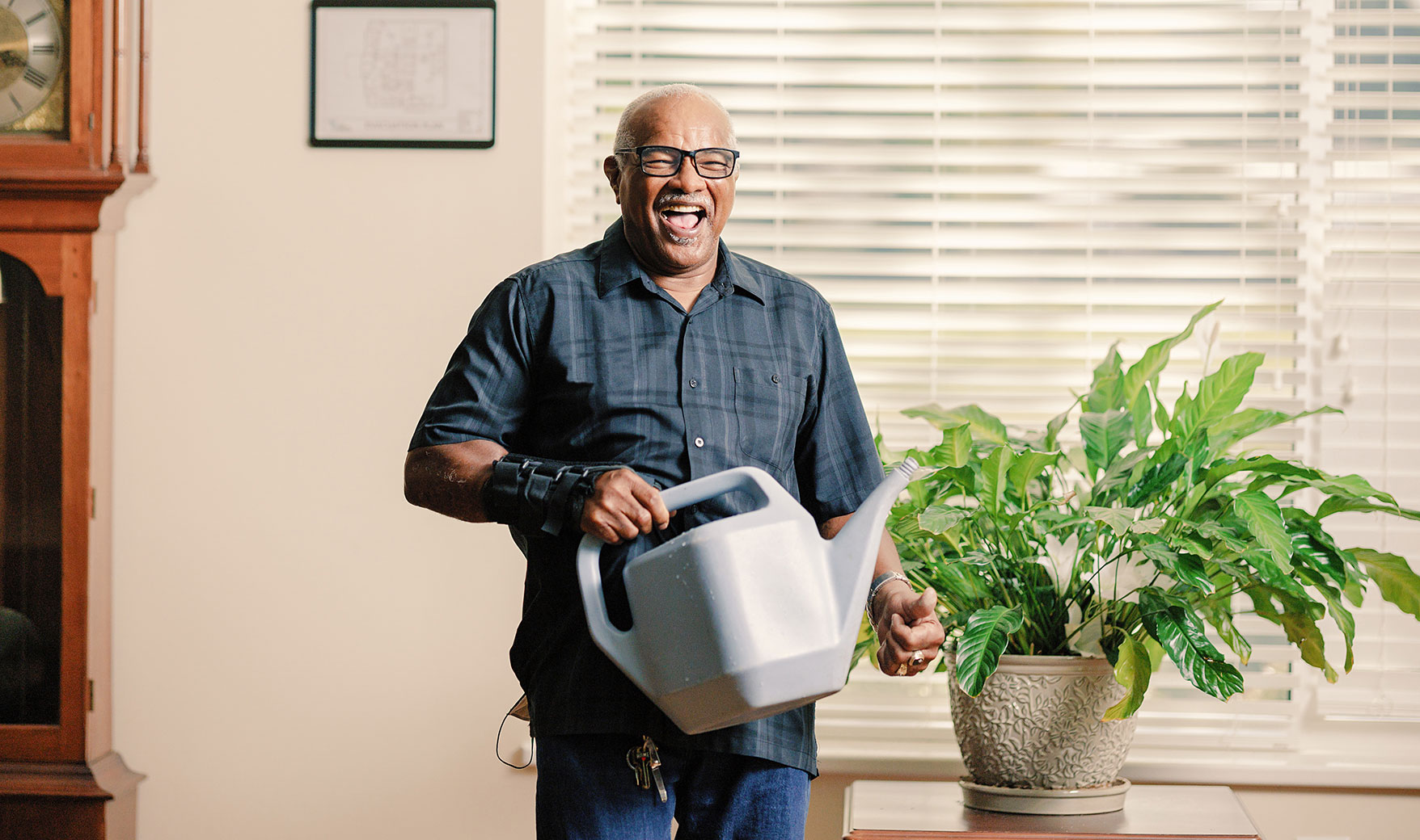 Volunteer Man with watering can